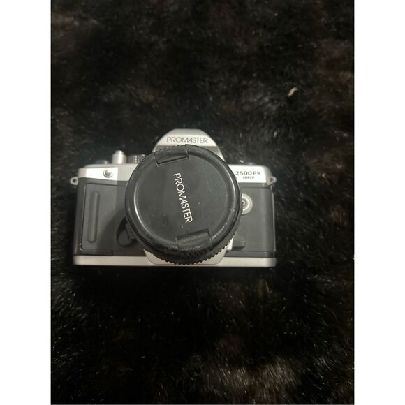 ProMaster 2500PK Super 35mm SLR Film Camera with 58mm f 1.2 Lens